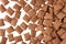 Chocolate pads corn flakes on white background. Cereals texture.