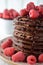 Chocolate pancakes with raspberries