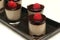 Chocolate Panna cotta with raspberry in glasses