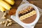 Chocolate, peanut-butter, banana, smoothie bowl overhead scene on rustic wood