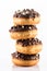 Chocolate and Peanuts Donut or Dougnut Tower on White Background