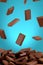 Chocolate Pieces Falling on Chocolate Pile, 3D Rendering