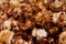 Chocolate popcorn macro with blur background.