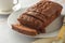 Chocolate pound cake. Homemade dark chocolate pastry for breakfast or dessert, bright background