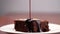 Chocolate pouring on cake in slow motion. Topping chocolate on homemade brownie dessert