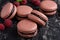 Chocolate and raspberry french macarons with ganache filling