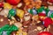 Chocolate Santa Claus wanders through sweets, biscuits and gingerbread