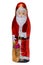 Chocolate Santa isolated. Close-up of a cheerful wrapped chocolate Father Christmas or the good Saint Nicholas figure isolated on