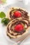 Chocolate swiss roll cake with strawberries