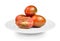 Chocolate Tomato or Brown color tomato in plate on white background