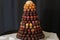 chocolate truffle tower with assorted flavors and colors