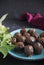 chocolate truffles, dark background. Delicious treat, sweet dessert