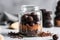 Chocolate truffles in a glass jar on a gray background, Delicious truffle cake closeup inside a glass jar, AI Generated