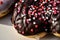 Chocolate and vanilla heart donuts with tiny red heart sprinkles on top