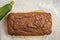 Chocolate vegan zucchini bread, white background.