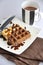 Chocolate Waffle Dish with Cup of Hot Chocolate