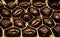 Chocolates in the box. Set of chocolate candies. Group of delicious chocolate pralines top view..
