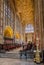 Choir Stalls, brass eagle lectern and vaulted ceilings inside Sherborne Abbey, Dorset, UK