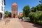 Chojnice, pomorskie / Poland - May, 31, 2020: City walls with an entrance gate. Historic buildings in Central Europe