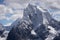 Cholatse mountain peak in cloudy day view from Renjo la pass, Everes region, Nepal