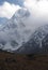Cholatse snow summit in clouds, Himalaya, Nepal