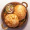 Chole Bhature a delectable combination of spicy chana masala.