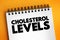 Cholesterol Levels text, medical concept on notepad for presentations and reports
