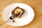 Chololate marble cake in a plate nibbled with a fork
