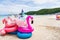 Chon Buri, Thailand - October, 02, 2021 : fancy swim tube on the beach Inflatable duck.Fantasy Swim Ring for Summer sea Trip on