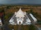 Chonburi, March 12, 2023. Wat Phon Prapa Nimit, This striking white Buddhist temple in a tranquil setting features a silver and