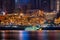 Chongqing, China - Dec 22, 2019: Night neon light view of cruise ship near historic architecture in Hongya cave