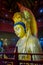 CHONGYUANG TEMPLE, CHINA: Close up beautiful golden buddha statue, great detailed decorations, part of temple area