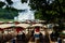 Chongzhuo, China - July 25, 2018: Tourist boats by the Detian Ban gioc waterfalls in China