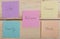 Choosing family or career concept - colorful sticky notes with words balance, work, career, family, life