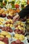 Choosing potatoes in an indoor market