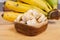 Chopped banana in wooden bowl