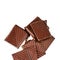 Chopped chocolate bar isolated on white background. Dark chocolate pieces closeup. Chocolate pieces,