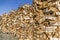 Chopped firewood Log stored in a round container of welded wire