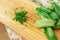 Chopped fresh greenery spinach, scallion onion in wooden cutting board. Healthy vitamin diet eating