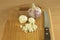 Chopped garlic on a wooden cutting board