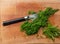 Chopped herbs on cutting board