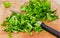 Chopped herbs on cutting board