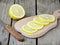 Chopped lemon slices on a wooden board