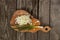 Chopped onion lies on a wooden board on the table