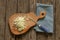 Chopped onion lies on a wooden board on a table in the kitchen