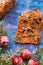 Chopped pieces of Christmas cake with dried fruits and candied fruits