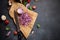 Chopped red Mars Onion on wooden cutting board at domestic kitchen