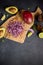 Chopped red Mars Onion on wooden cutting board at domestic kitchen