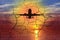 Chopped into small cracks photo of a plane flying in the sunset, concept of an aircraft accident, disaster, canceled flight,