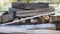 A chopped stack of firewood lies in the brazier. Close-ups of red and yellow flame tongues appear in their background. Time Lapse